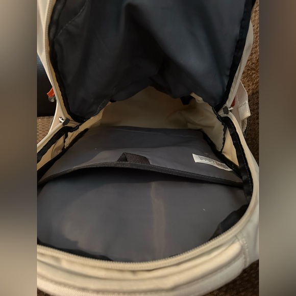 The North Face Cream Backpack with Orange Zipper Pulls - Picture 6 of 9